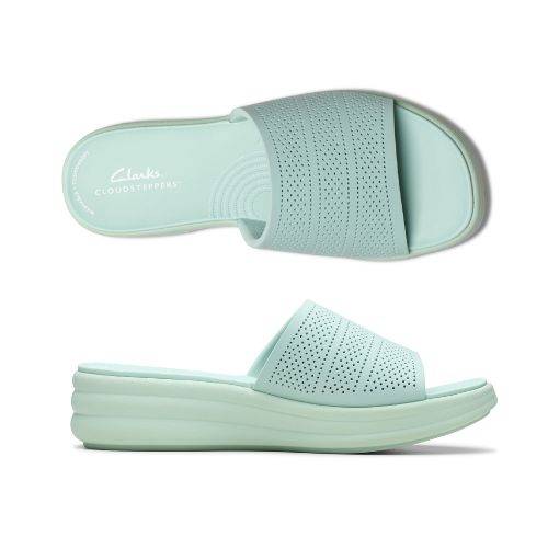 Top and profile for the Drift slide sandal with platform EVA and EVA band all in baby blue. Dotted perforations on upper and rounded lines on midsole for detailed design. Clarks logo in while on heel of baby blue footbed