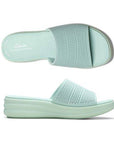 Top and profile for the Drift slide sandal with platform EVA and EVA band all in baby blue. Dotted perforations on upper and rounded lines on midsole for detailed design. Clarks logo in while on heel of baby blue footbed