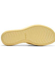 Wavy texture outsole in yellow EVA on Drift slide sandal. Clarks logo stamped in middle