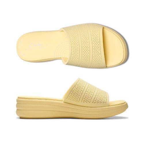 Top and profile for the Drift slide sandal with platform EVA and EVA band all in yellow. Dotted perforations on upper and rounded lines on midsole for detailed design. Clarks logo in while on heel of yellow footbed