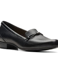 Juliet Shine loafer in black. Black leather upper with slight stacked heel and a decorative band with silver bead across the front. 