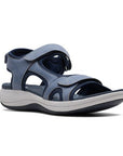 Blue walking sandal with Velcro on heel, toe and ankle strapes. Dark blue lining with lighter blue on the upper for contrast look. Light grey thick midsole and black rocker rubber outsole