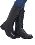 Tall leather lace up boot with lugged black outsole.