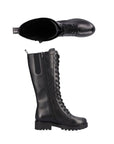 Tall leather lace up boot with lugged black outsole. Boot has inside zipper and Remonte branded heel pull tab.