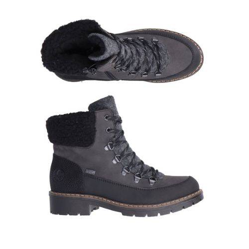 A pair of A Rieker black leather ankle boot with fabric cuff, tan accent stitching at midsole and rugged black outsole.