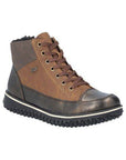 A Rieker brown leather sneaker boot with flat brown laces, grey accents at cuff and heel with silver wrap above white midsole and black aggressive tread.