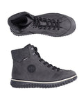 A pair of Rieker grey suede sneakers boot with black laces, circle logo on side and black aggressive tread.