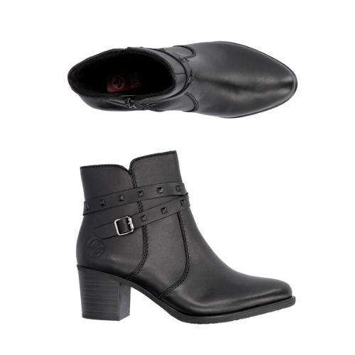 A pair of black leather Rieker dressier block heel boots with  two studded straps and side buckle and zipper.