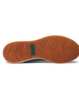 Textured brown rubber outsole with green Josef Seibel logo in the center. 