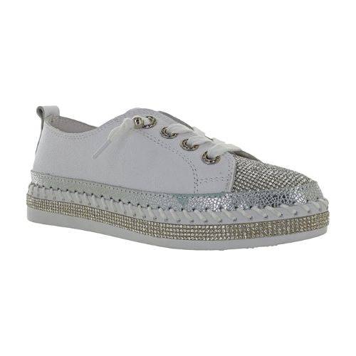 A Bernie Mev sneaker in white leather with silver rhinestones covering the toe and midsole, white laces and a white platform outsole attached with large white stitching.