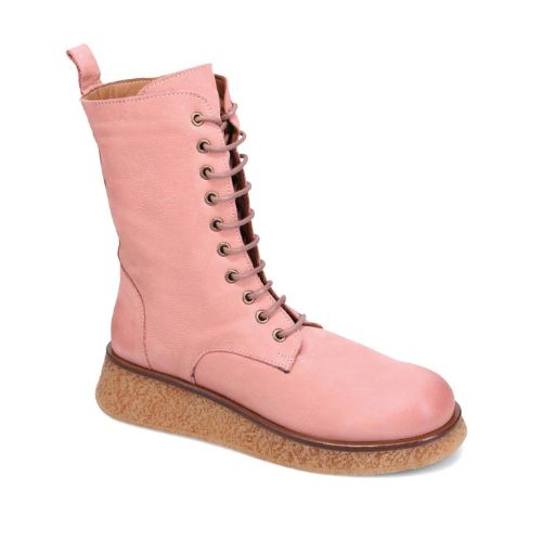 A light pink nubuck lace up boot with a tan crepe outsole. 