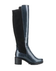 Side view of Bos & Co Idun Tall Boot showcasing a navy patent leather front, black suede back, and durable chunky heel.