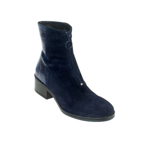 Navy ankle boot with zipper at front. The zipper has a circle charm. Back half of boot is a crocco patent and front half is navy suede. The 2" heel outsole is black