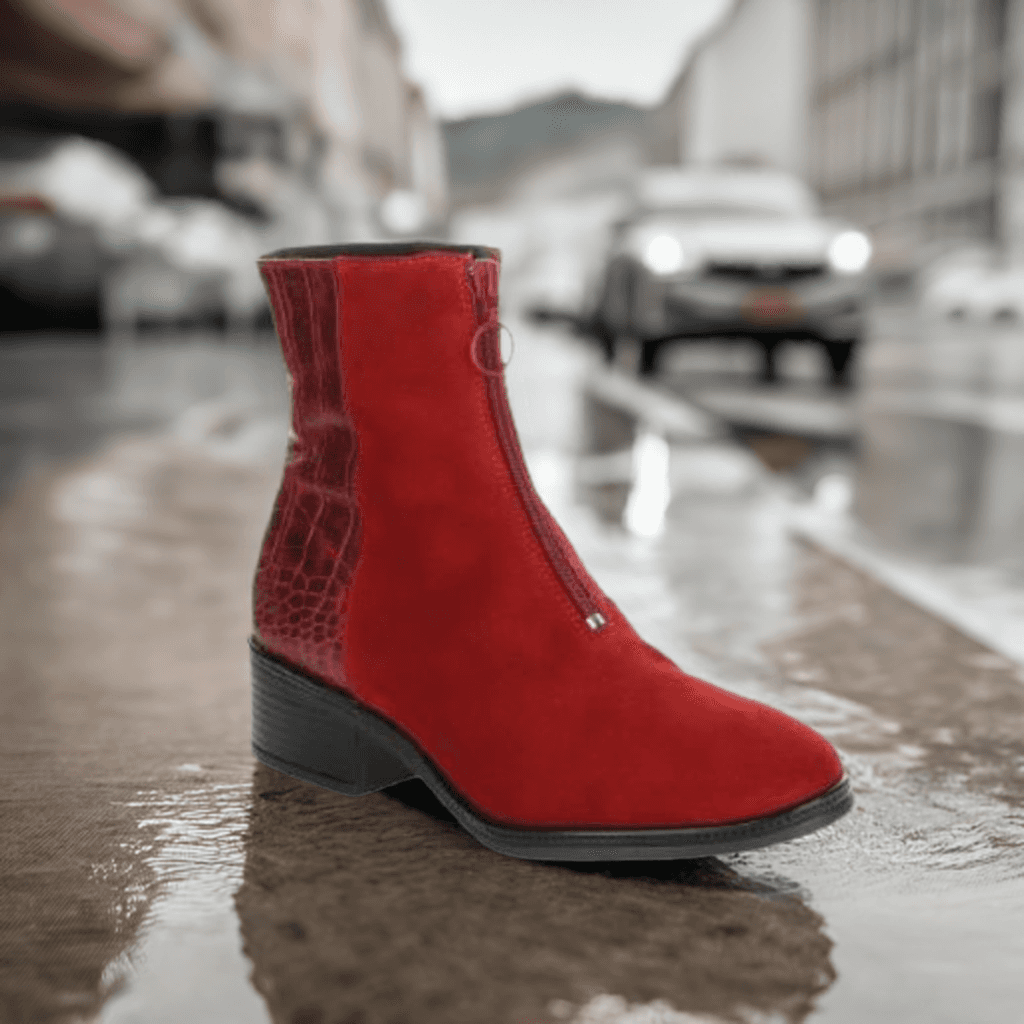 Bos & Co Jordon Zip Ankle Boot in red suede displayed outdoors on a rainy street, highlighting its waterproof and stylish design.