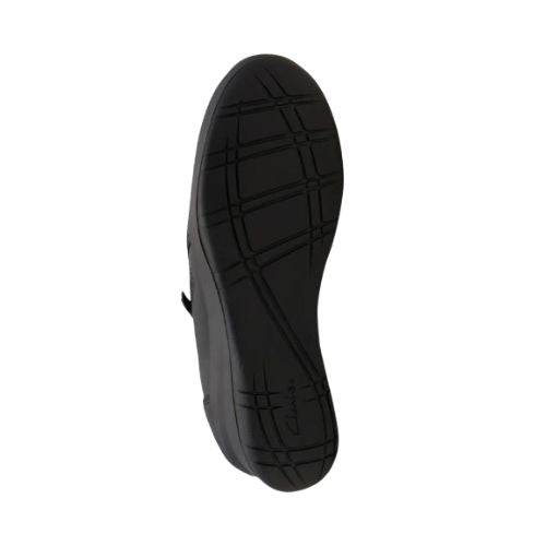 Black treaded outsole on the wedge from the bottom view