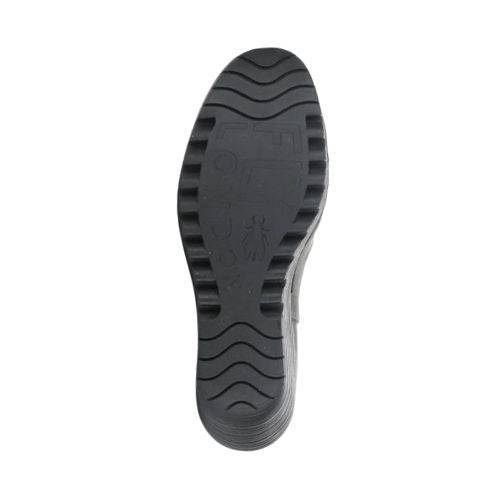 Bottom sole view of FLY London Yade Wedge Boot showcasing its textured black outsole for grip and stability.