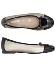 Pair of Remonte black and white ballet flats with large decorative silver/black buckle on toe and beige lining.