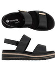 Pair of Black Remonte backstrap sandals with velcro straps, detailed gold bars, and a tan and black platform mid and outsole.