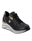 Black lace-up sneaker with gold accents in the side zipper, top of heel cut and single diagonal line down to midsole. the tongue has Remonte stamped at the top and black laces are flat. The midsole is white with black wave lines and the outsole is black