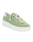 Remonte green platform sneakers with side zipper, blue/green/yellow abstract design laces, white heel cap and white platform outsole.