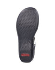 Black wavy treaded outsole with Red Rieker logo on heel.