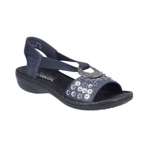 Rieker navy sling back sandal with circle medallion on top of floral sequined toe strap and a black footbed and outsole.