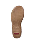 Brown wavey treaded outsole with red Rieker logo on heel.