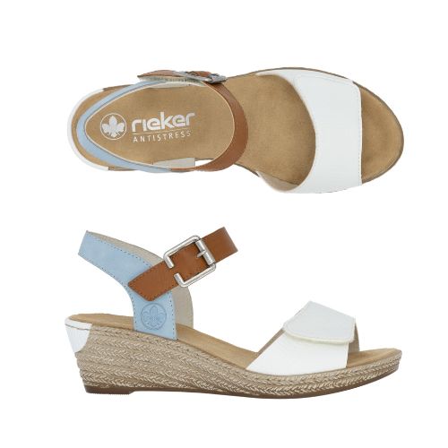 Pair of Rieker sling back wedge with blue back strap, brown buckle strap, white velcro toe strap, beige logo'd footbed and tan textured midsole.