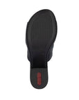 Black block heed outsole with light tread and red Rieker logo on heel.