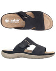 Pair of Rieker black slide sandals with Velcro loop closure, beige footbed and grey outsole.