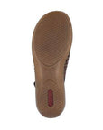 Brown hexagon treaded outsole with red Rieker logo on heel.