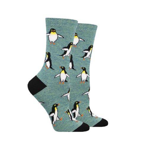 Socksmith&#39;s green bamboo socks with penguins walking.