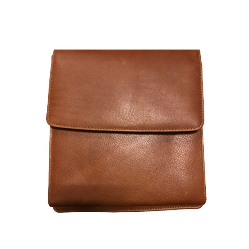Half flap organizer bag in tan. A brown leather bag with flap closure and a detachable shoulder strap.