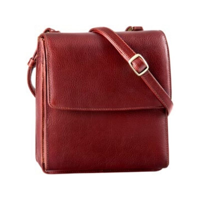 Half flap organizer bag in whiskey. A reddish brown leather bag with a flap closure and a detachable shoulder strap.