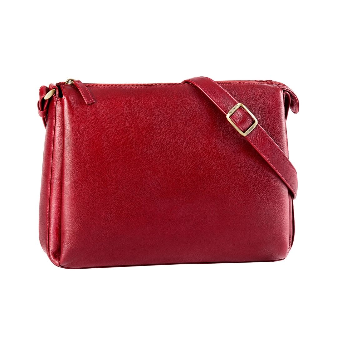 Red leather handbag with top zipper and adjustable shoulder strap.