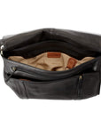 Interior view of the main compartment, showing multiple zippered pockets, a key ring, and an additional slip compartment. Lining is beige with Derek Alexander branding. 