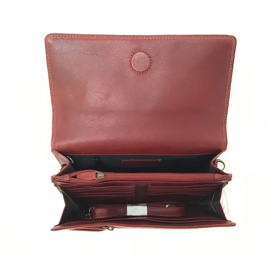 Interior of half flap crossbody bag in red. Lining is black with red leather trim. Displays multiple zippered pockets, card slots, and two main compartments.