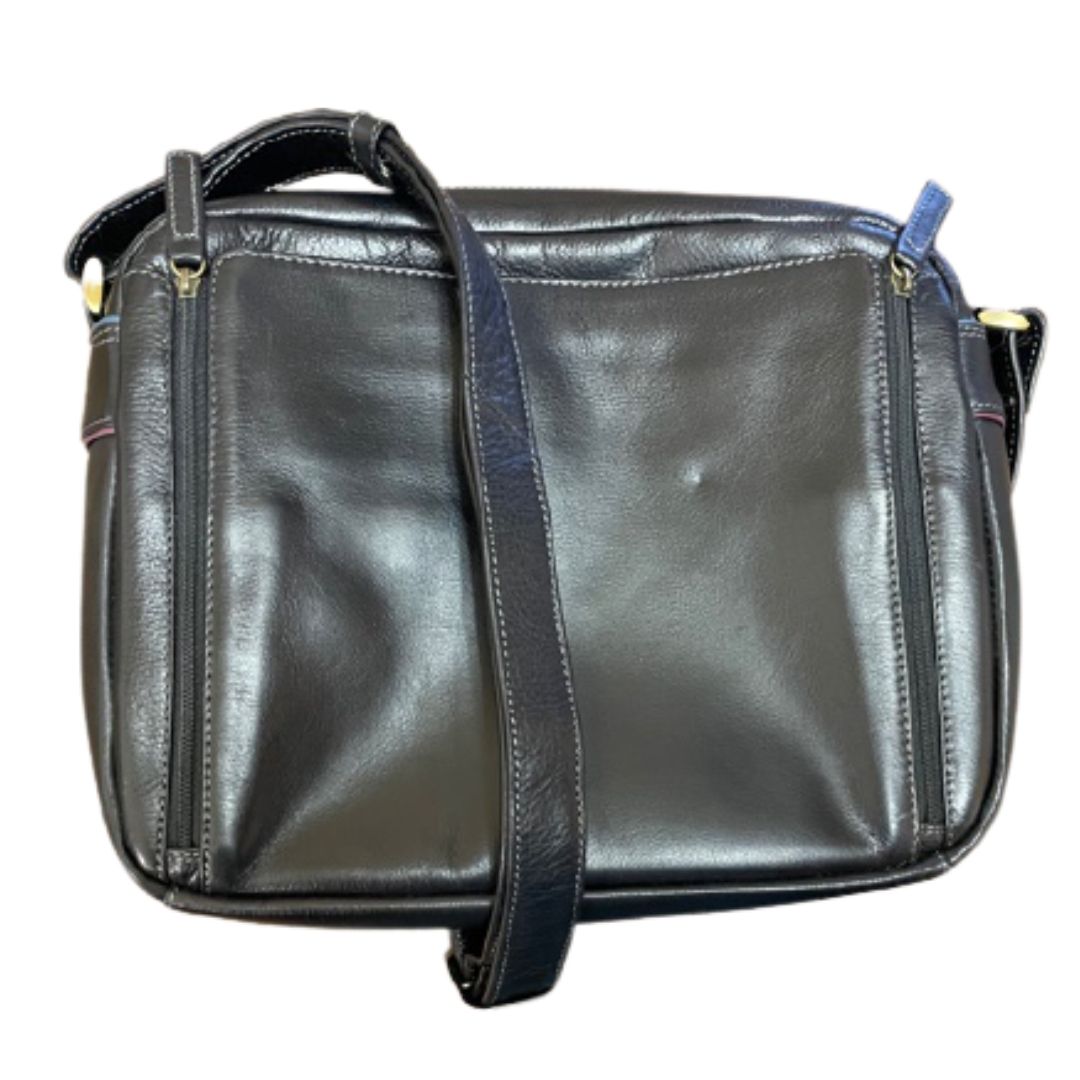 Black leather bag with zippers running vertically down on each side, as well as a zipper along the top for the main compartment. 