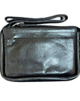 Rear exterior of black leather organizer bag, featuring a zippered pocket. 