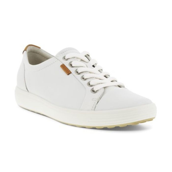 White leather sneaker with a brown Ecco logo tag near the white laces and a white midsole and a beige outsole. 