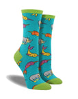 Blue socks with green accents featuring scuba diving rhinos and narwhals