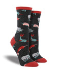 Grey socks with red accents featuring scuba diving rhinos and narwhals