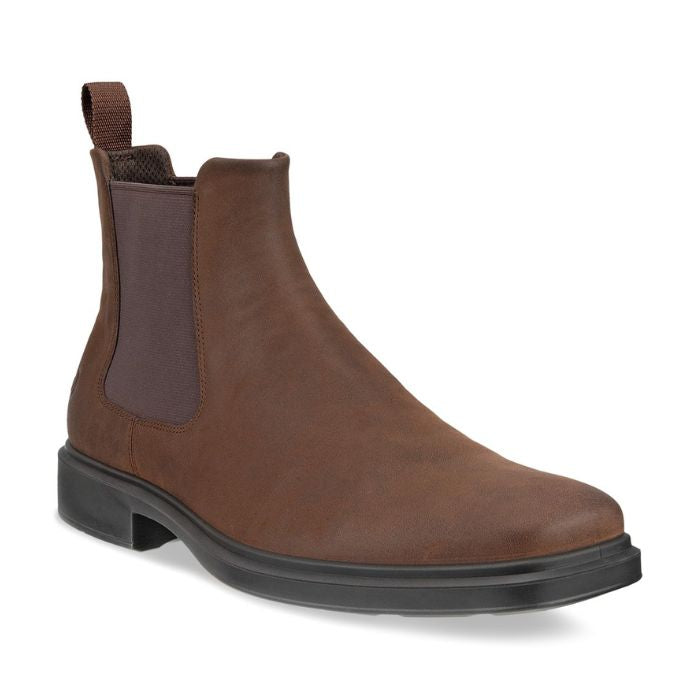 An Ecco Chelsea boot with a brown nubuck upper with a black outsole and dark brown elastic goring.