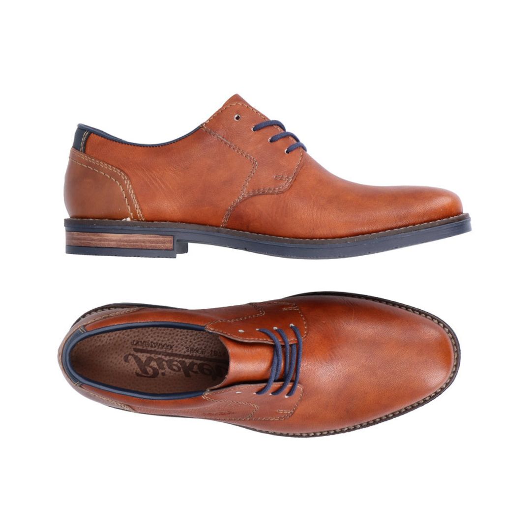 Top and side view of brown leather dress shoe with navy laces. Rieker logo on insole.