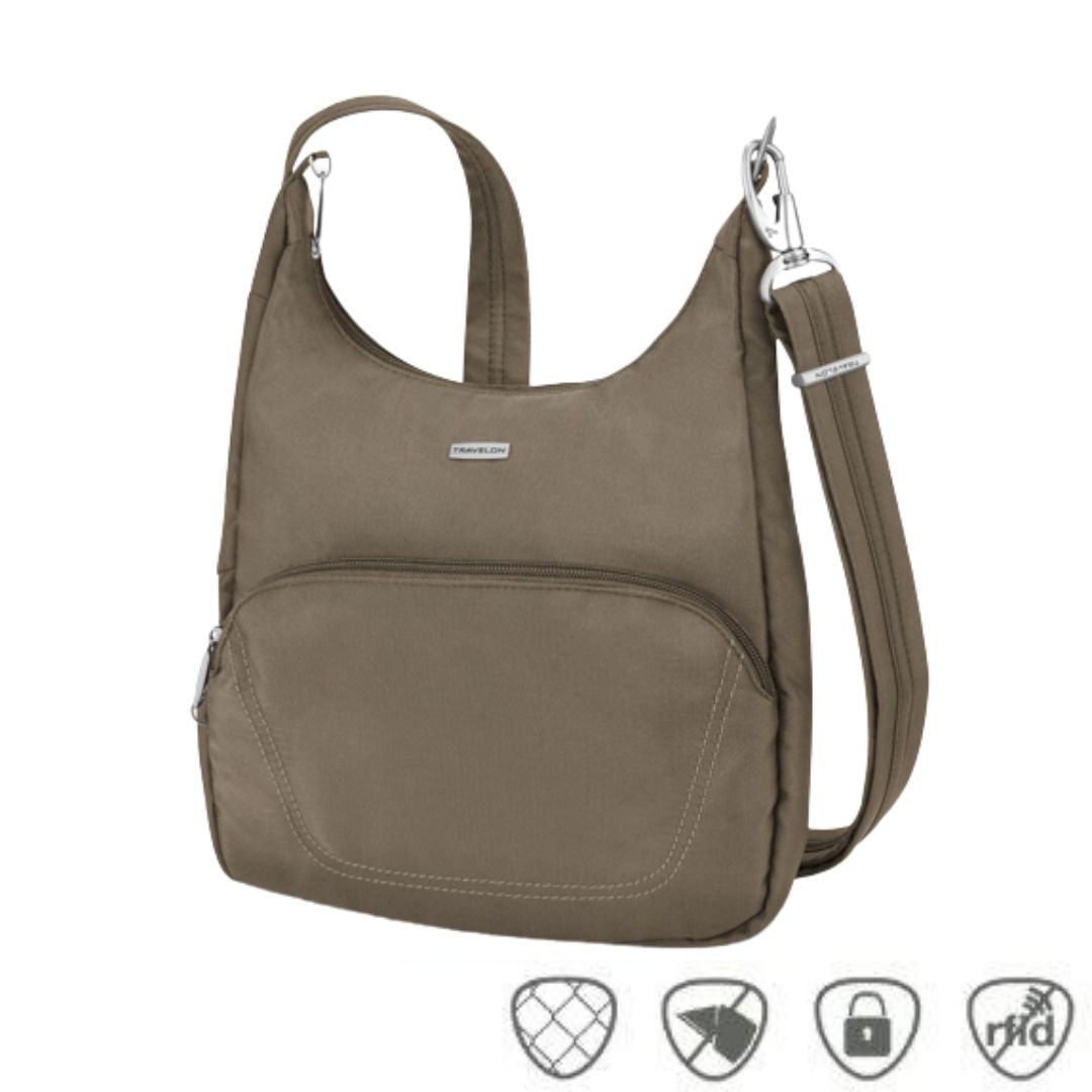 Nutmeg coloured messenger bag with adjustable shoulder strap, front zippered pocket and silver Travelon logo