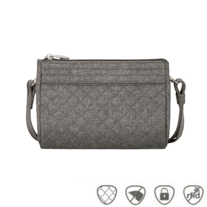 Grey quilted crossbody bag. Anti-theft symbols on bottom.