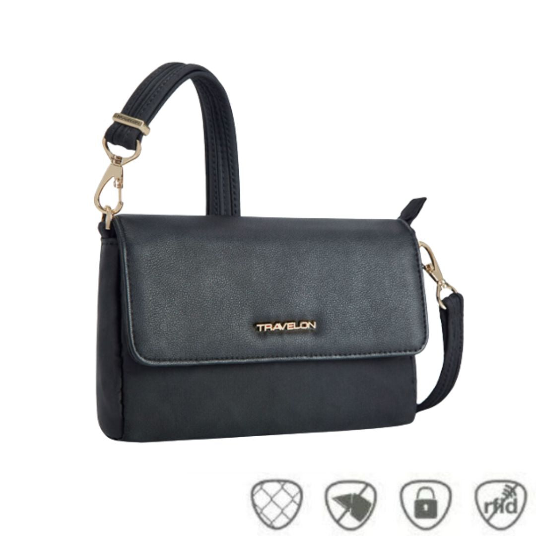 Black half flap crossbody bag with gold Travelon logo emblem on front flap.