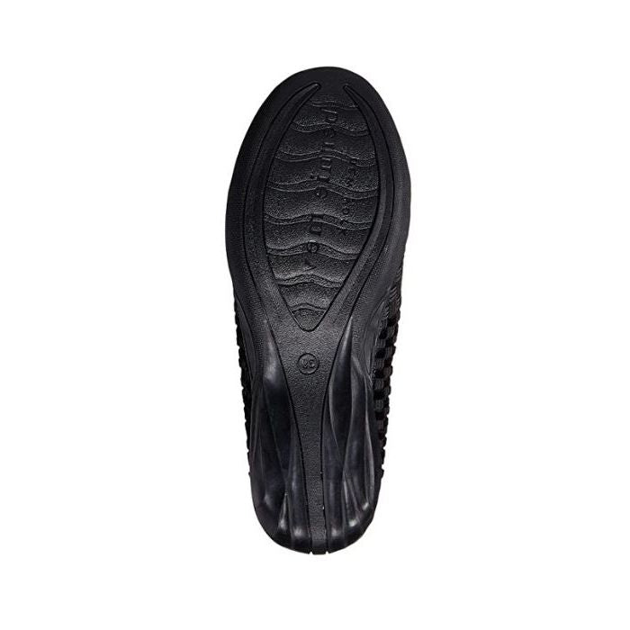 Black outsole of the Catwalk flat with Bernie Mev logo on ball of foot.