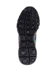 A Bernie Mev black rubber outsole with circle in square designed tred.