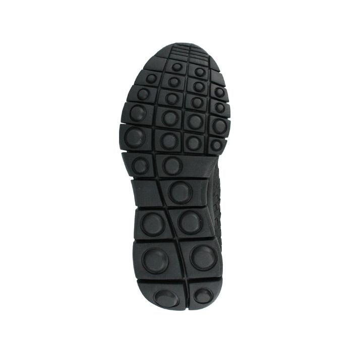 A Bernie Mev black rubber outsole with tred design of circles in squares.